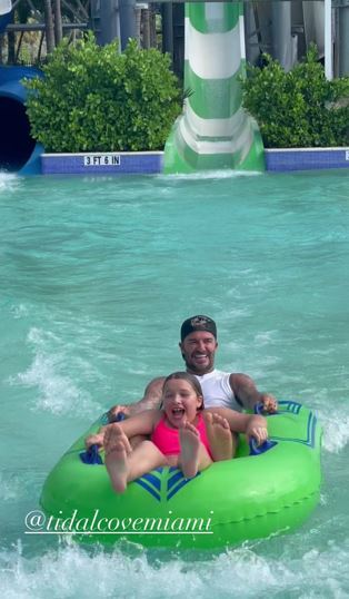 Beckhaм and his daughter ride the rapids