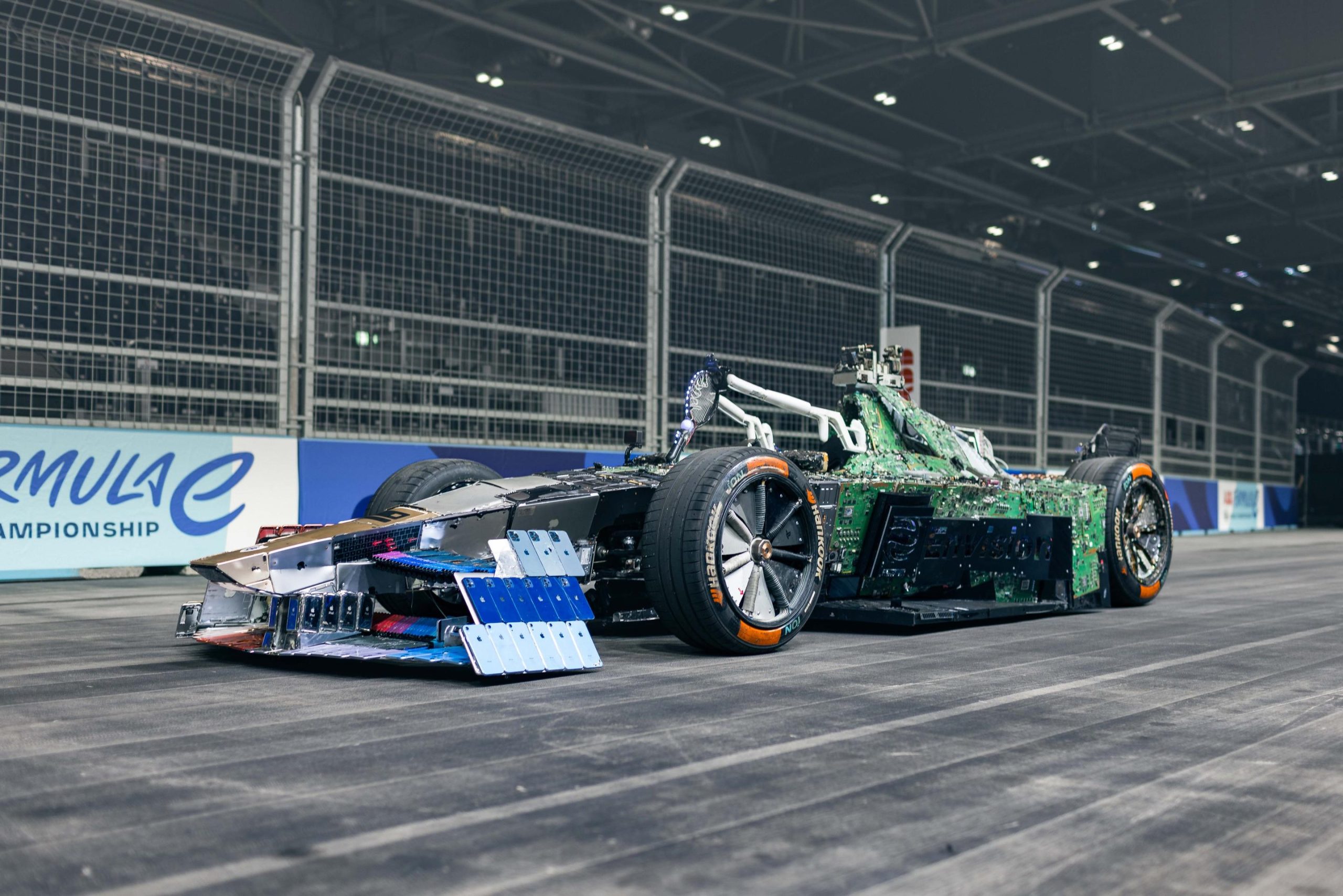 To highlight the issue of electronic waste and promote recycling and reuse, Envision Racing teamed up with artist Liam Hopkins to design and build a full-size, drivable replica of a Formula E racecar that's made from discarded gadgetry