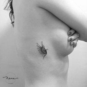 Stunning Rib Tattoos For Women with Meaning - mysteriousevent.com