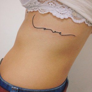 Stunning Rib Tattoos For Women with Meaning - mysteriousevent.com