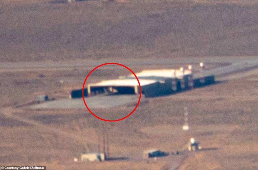 The hangar is just south of the main Nevada Test and Training Range complex at Area 51 and the object looks large, although it is unclear