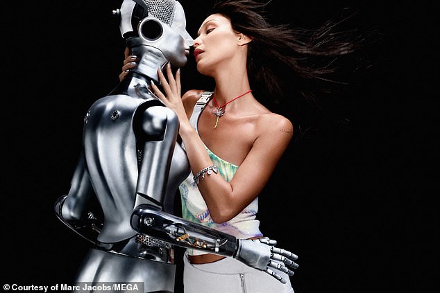 Sci-fi romance: Other snaps in the futuristic campaign showed her kissing a robot