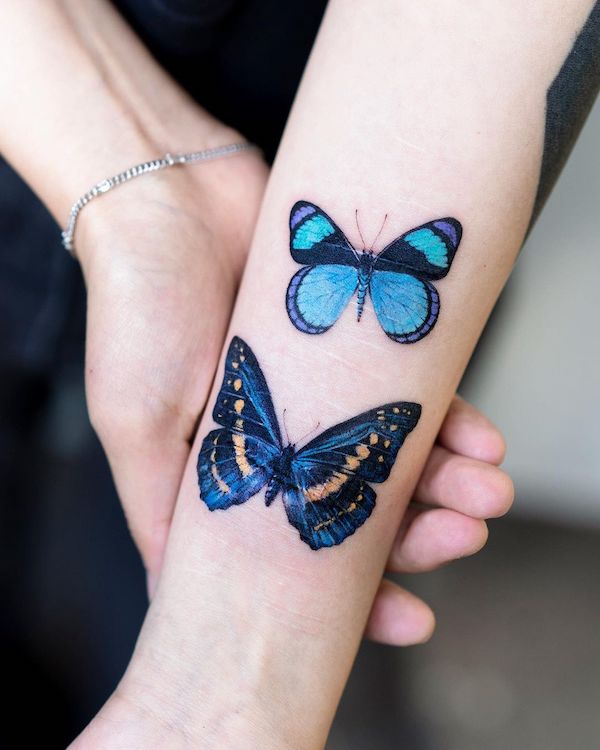 A pair of butterflies tattoo by @pokhy_tattoo