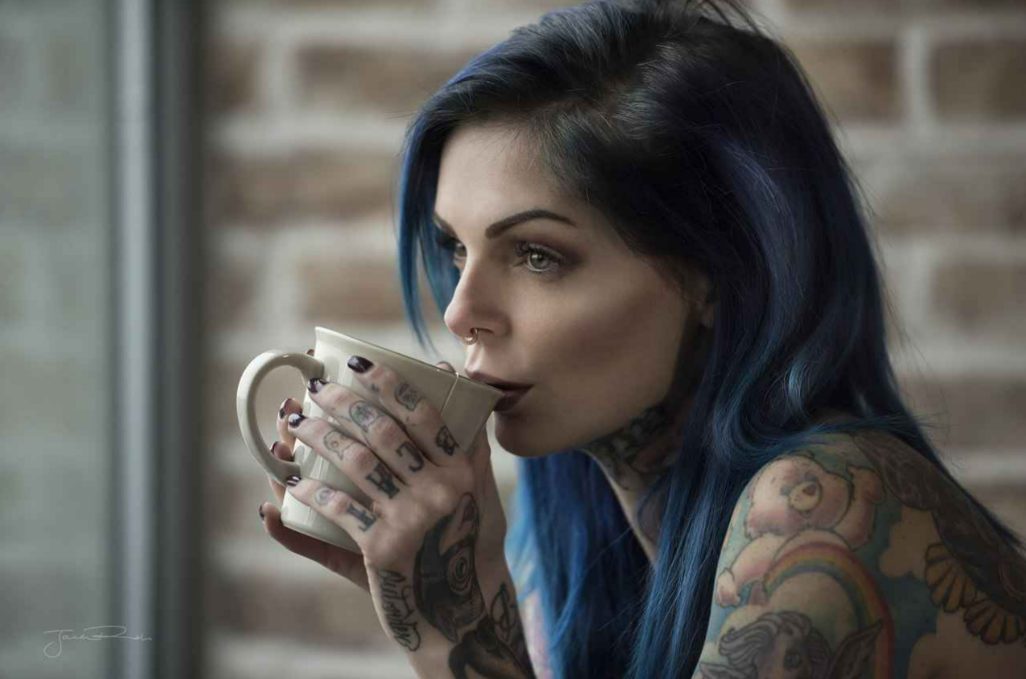 Explore the unique beauty of Riae's tattoos and be mesmerized by her captivating body art! - amazingtoday.net