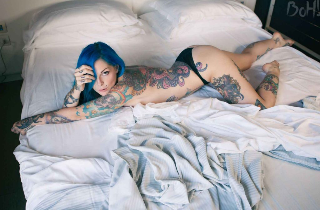 Explore the unique beauty of Riae's tattoos and be mesmerized by her captivating body art! - amazingtoday.net