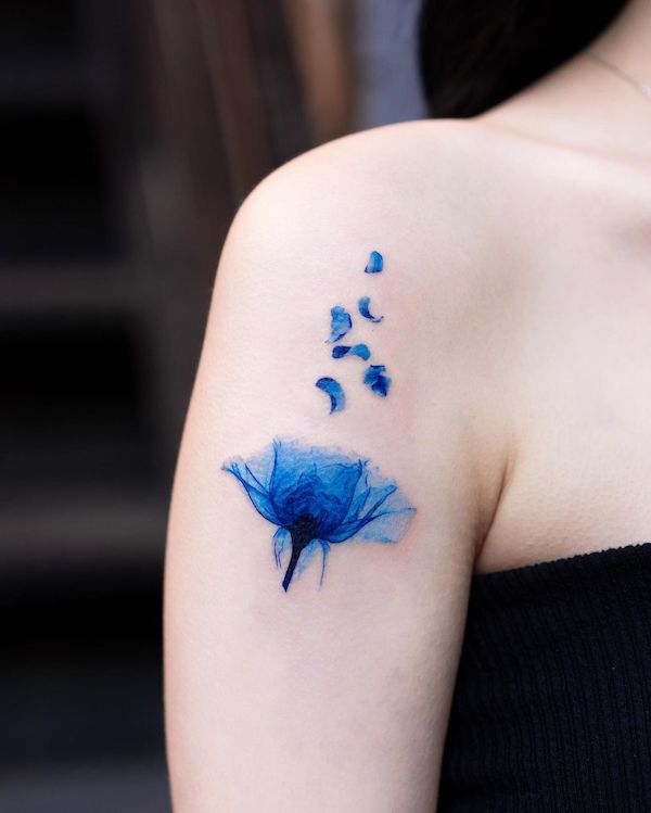 Flower and petals tattoo by @pokhy_tattoo