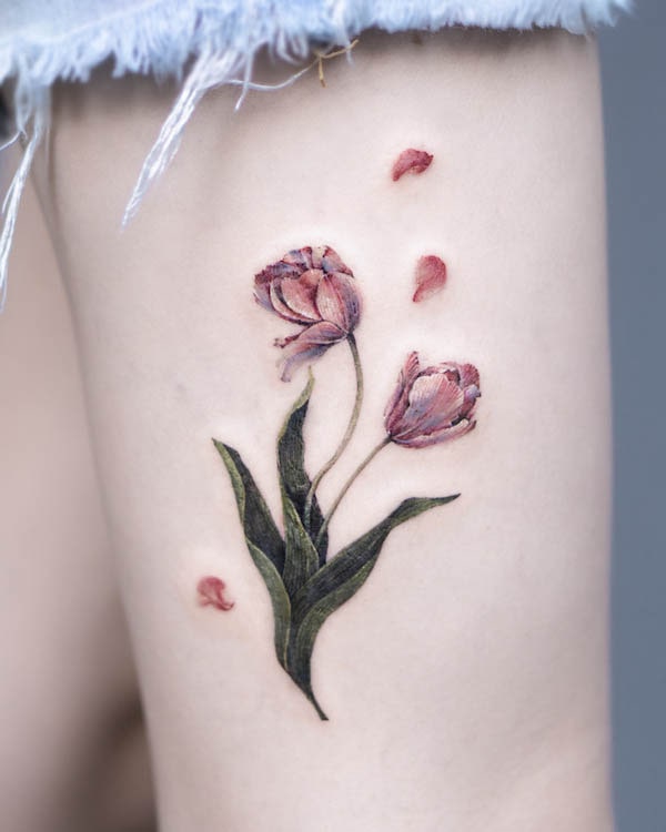 Flower thigh tattoo by Pokhy