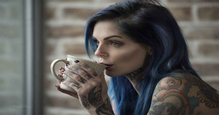 Explore the unique beauty of Riae's tattoos and be mesmerized by her captivating body art! - amazingtoday.net