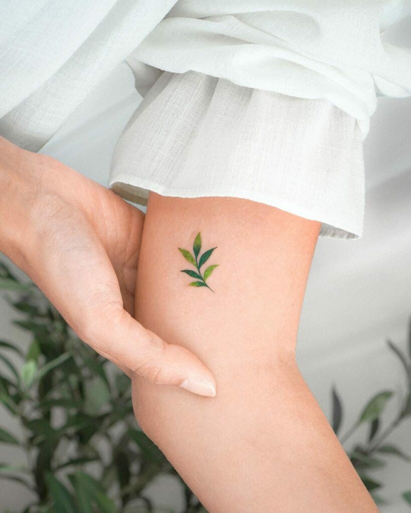 tiny sapling tattoo