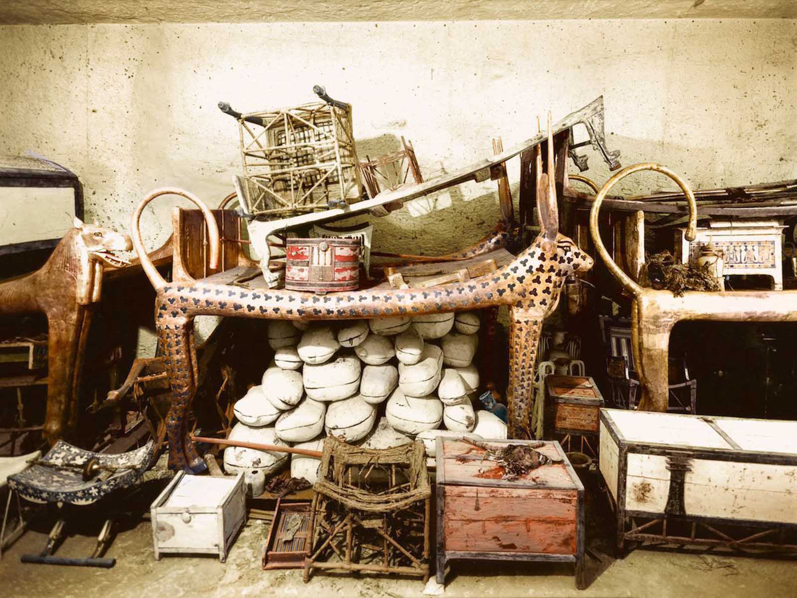 A ceremonial bed in the shape of the Celestial Cow, surrounded by provisions and other objects in the antechamber of the tomb.