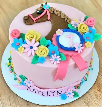 Elegant horse, flowers, and rosette horse cake