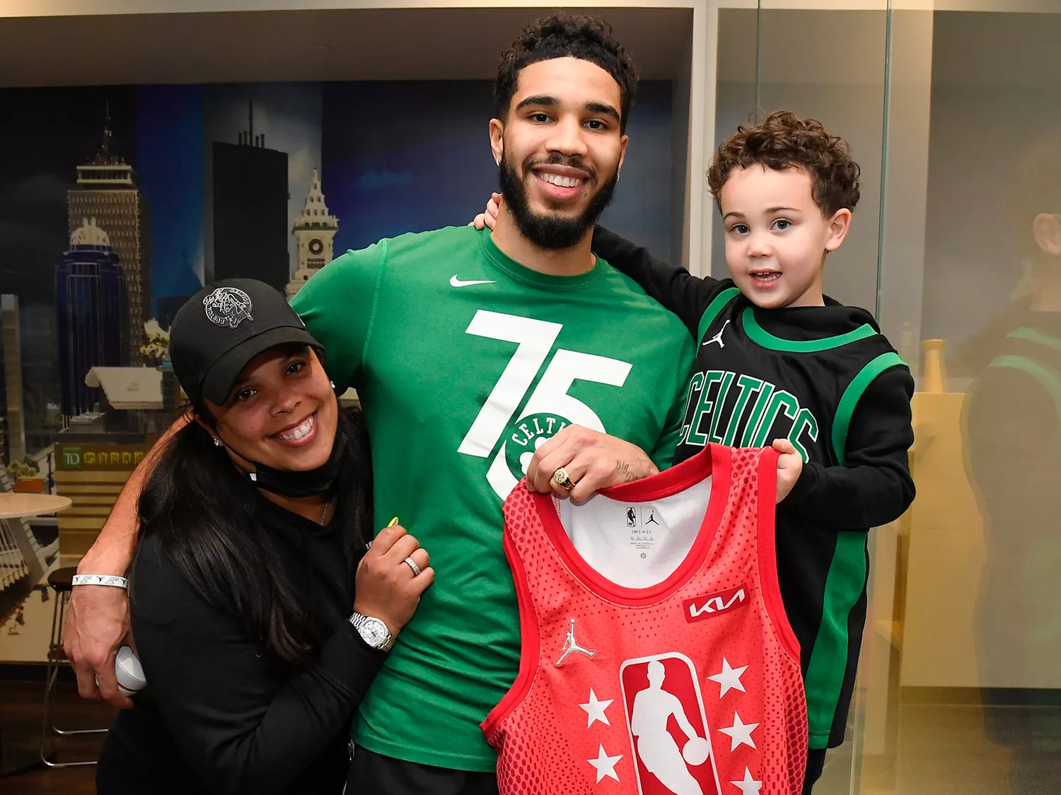 Jayson Tatum #0 of the Boston Celtics, his mom Brandy Cole and his son Deuce Tatum