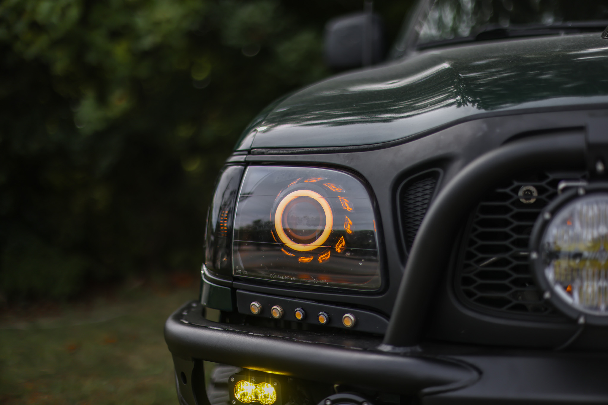 lamtac close up of the gen tacoma that has been upgraded to perfection from fox dsc coil springs to some overhead headlight cluster lights looking like a really sweet rig inside and out 6538969729027 Close-Up Of The Gen 1 Tacoma That Has Been Upgraded To Perfection From Fox Dsc Coil Springs To Some Overhead Headlight Cluster Lights, Looking Like A Really Sweet Rig, Inside And Out.