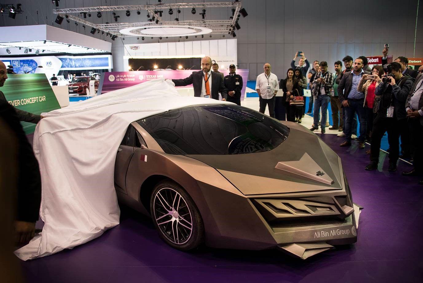 The stealth jet supercar: Qatar's first megacar unveiled with carbon fibre body and metallic gold paint