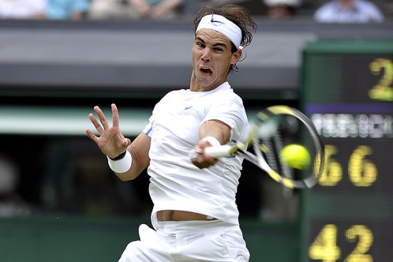 Nadal glides to first-round win at Wimbledon | Tennis | Al Jazeera