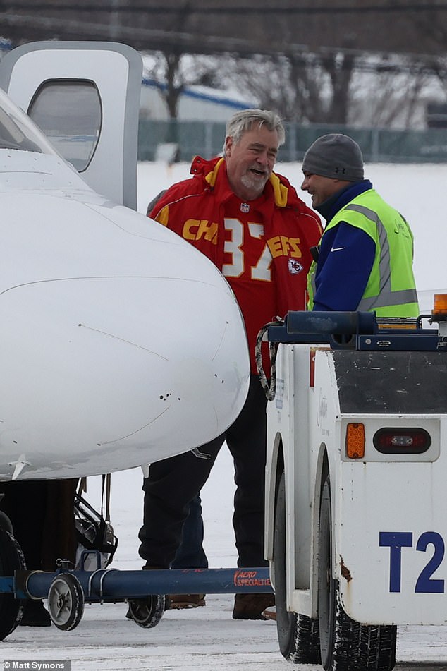 Ed Kelce is pictured wearing his son Travis' No. 87 underneath a Kansas City Chiefs jacket