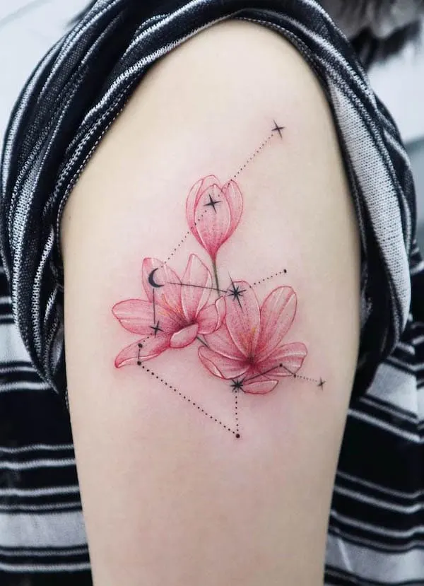 Constellation watercolor flower sleeve tattoo by @siren_ink
