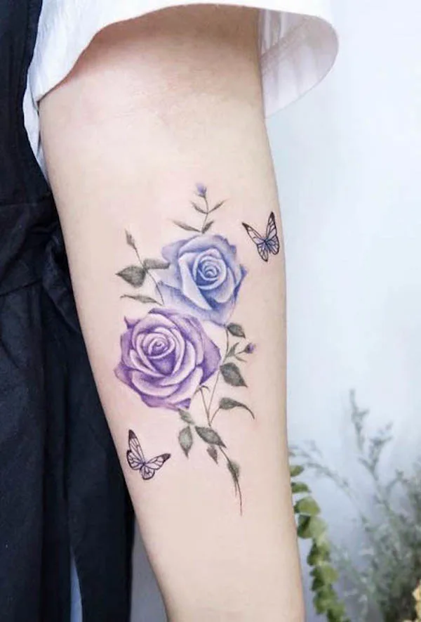 Watercolor roses arm tattoo by @ravenonetattoo