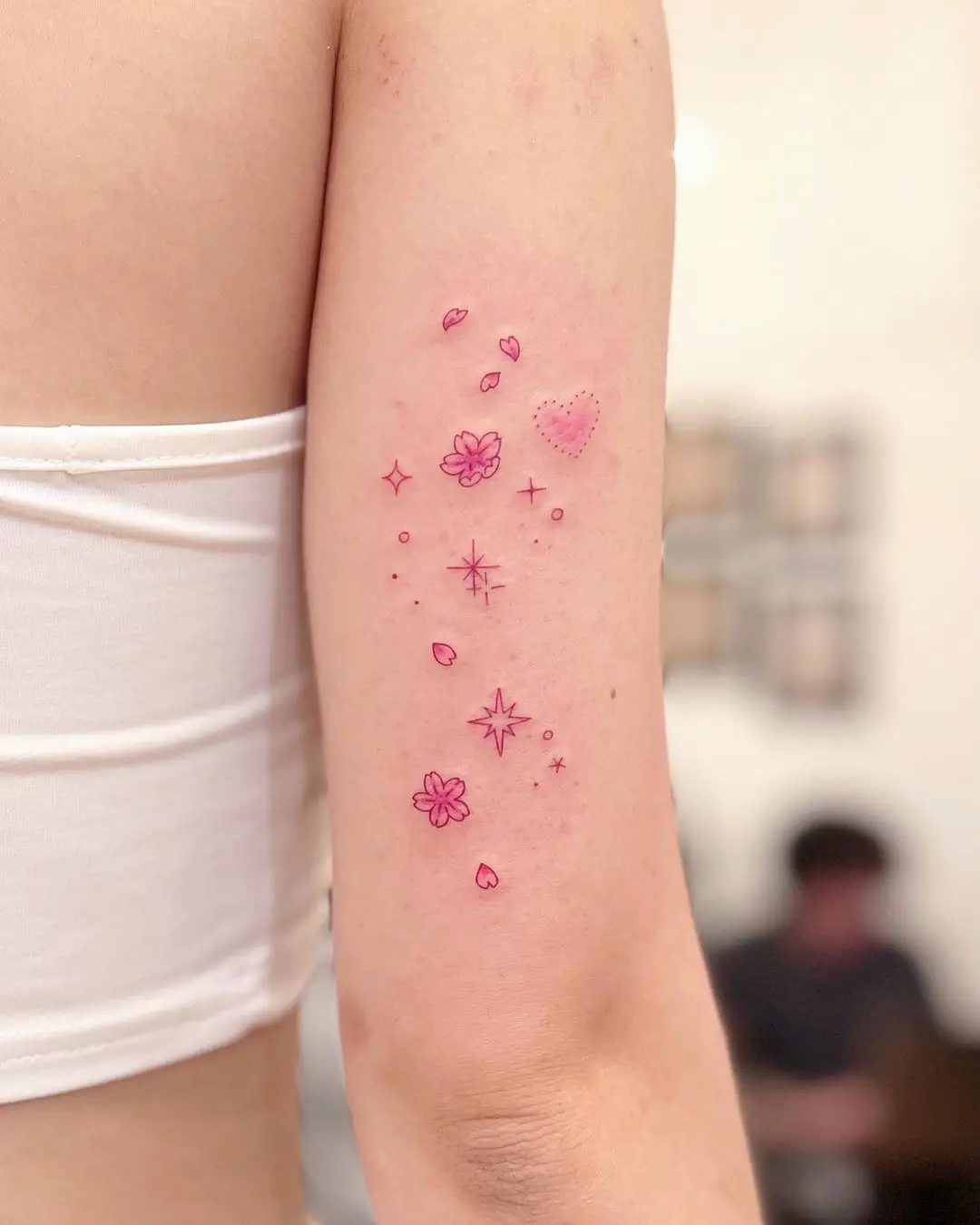 cherry blossom tattoo on arm by tattooist yeonnie