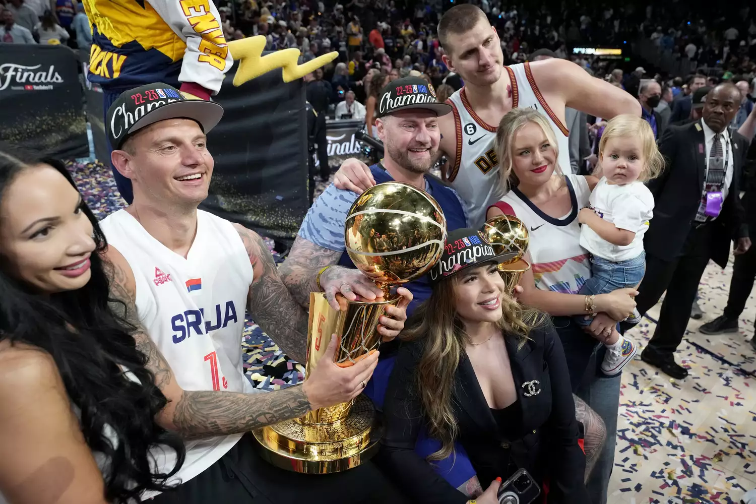 Nikola Jokic #15 of the Denver Nuggets poses for a photo with his family after winning Game Five of the 2023 NBA Finals on June 12, 2023 at Ball Arena in Denver, Colorado.