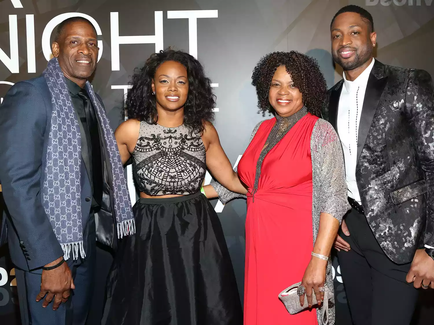 Dwyane Wade with parents Dwyane Wade Sr. and Jolinda Wade alongside sister Tragil Wade on the red carpet at A Night on the Runwade Event on March 19th, 2017.