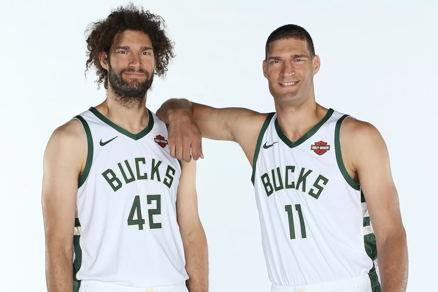 Robin Lopez #42 and Brook Lopez #11 of the Milwaukee Bucks pose for a portrait during Media Day on September 30, 2019.