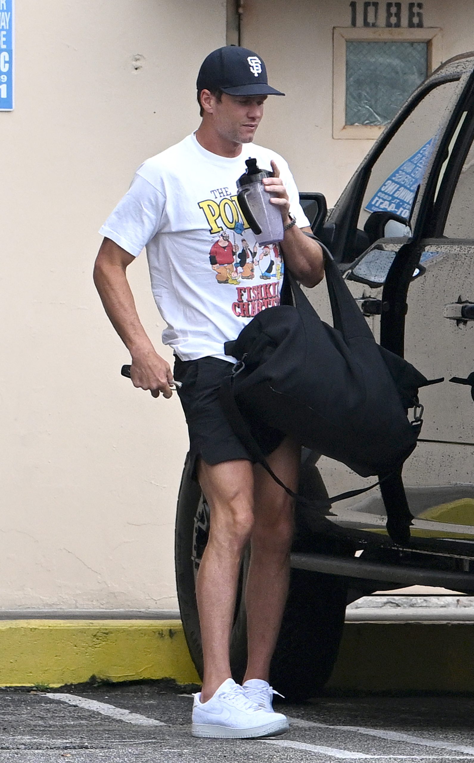 Brady was spotted in a Popeye themed-t-shirt and a San Francisco Giants baseball cap