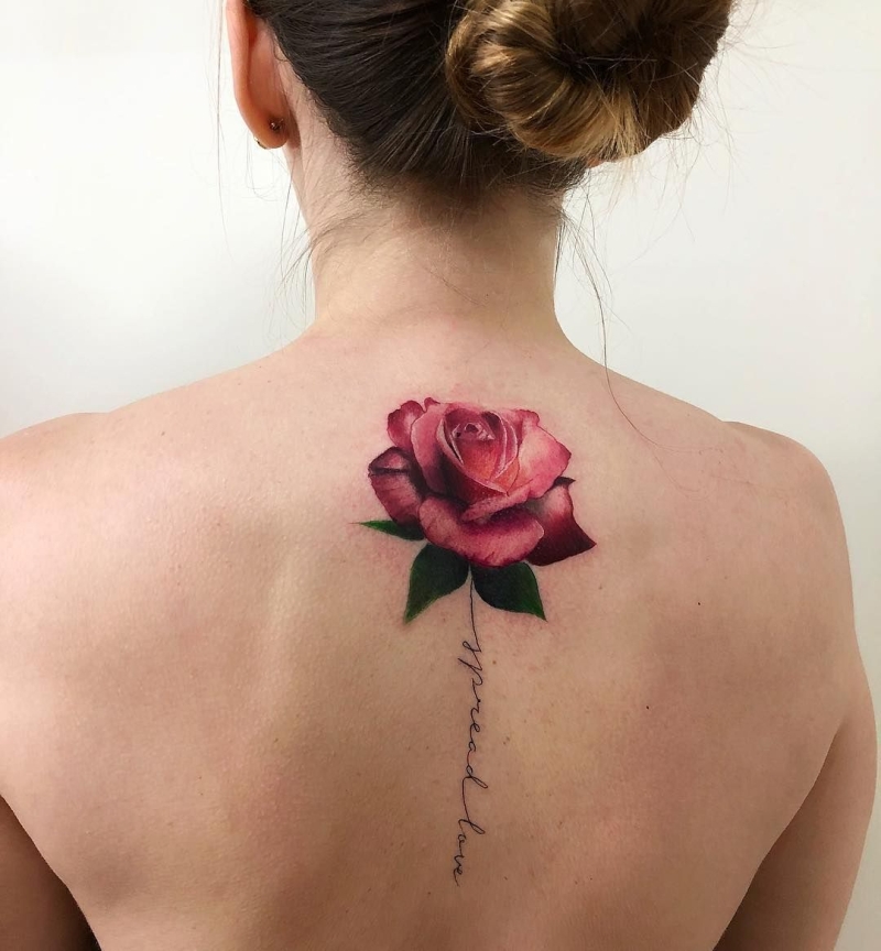 beautiful rose spine tattoo 1