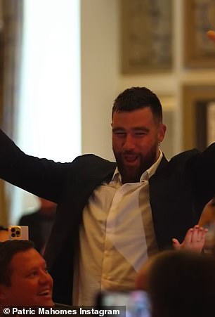 Kelce triumphantly caught the ball clear across the other side of the ballroom, and each autographed football was later auctioned off for $10K each