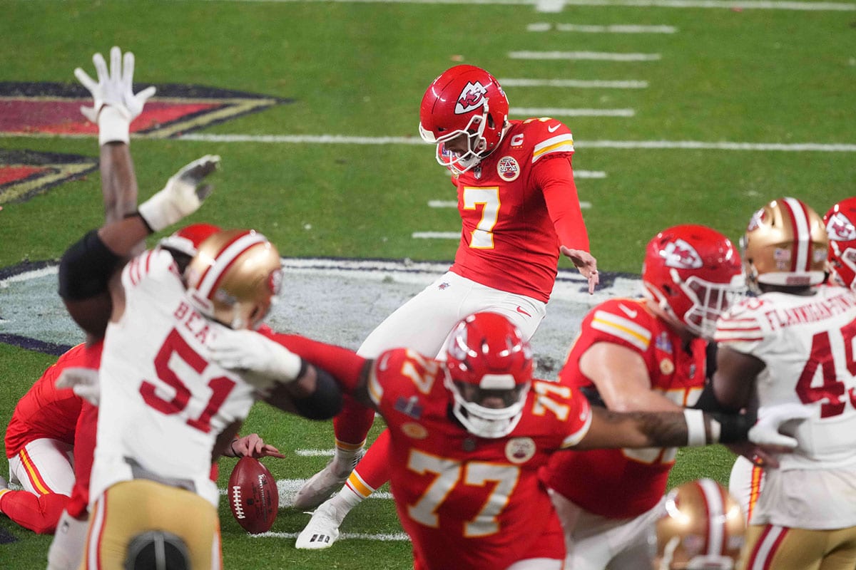 Kansas City Chiefs place kicker Harrison Butker (7) kicks the ball during the fourth quarter against the San Francisco 49ers in Super Bowl LVIII