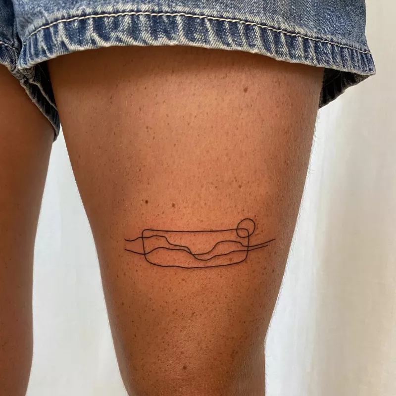 single line tattoo of a landscape 