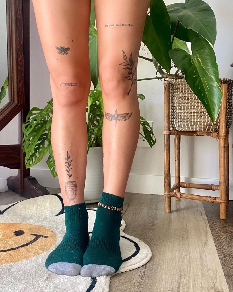 Multiple miniature leg tattoo designs for women

