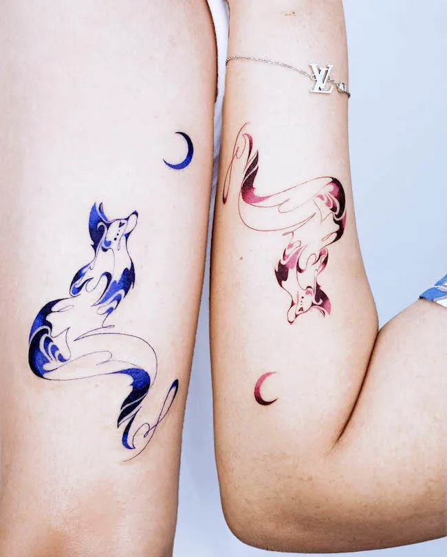 A pair of fox tattoos by @e.nal_.tattoo