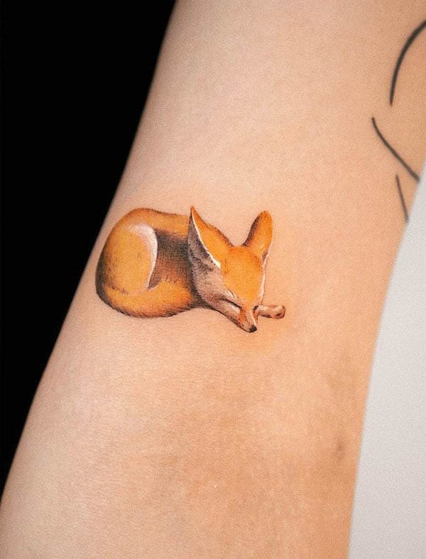 Cute little sleeping fox tattoo by @youngchickentattoo