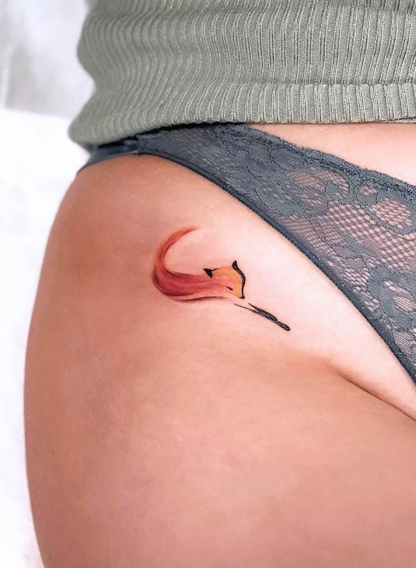 Cute small abstract fox hip tattoo by @alexandra.btattoo
