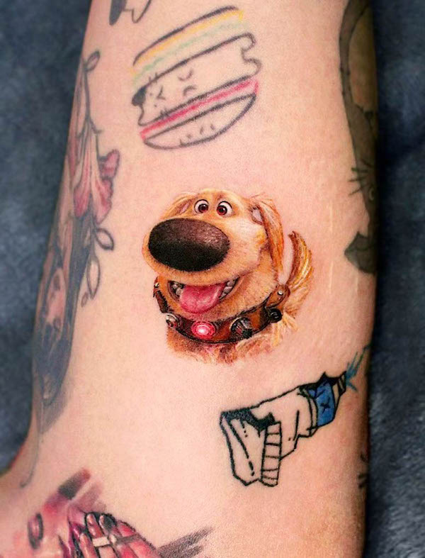Dug in Up dog tattoo by @eins_tattooer