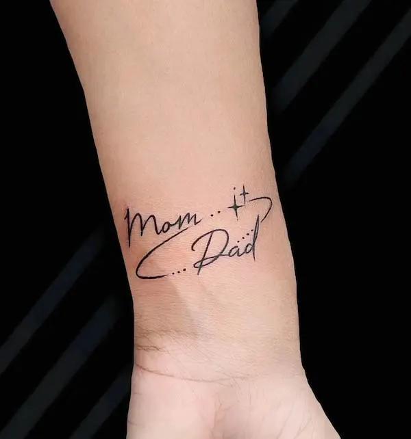 Mom dad wrist tattoo by @royal_tattoostudio