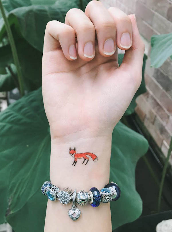 Small fox wrist tattoo by @jiah_2808