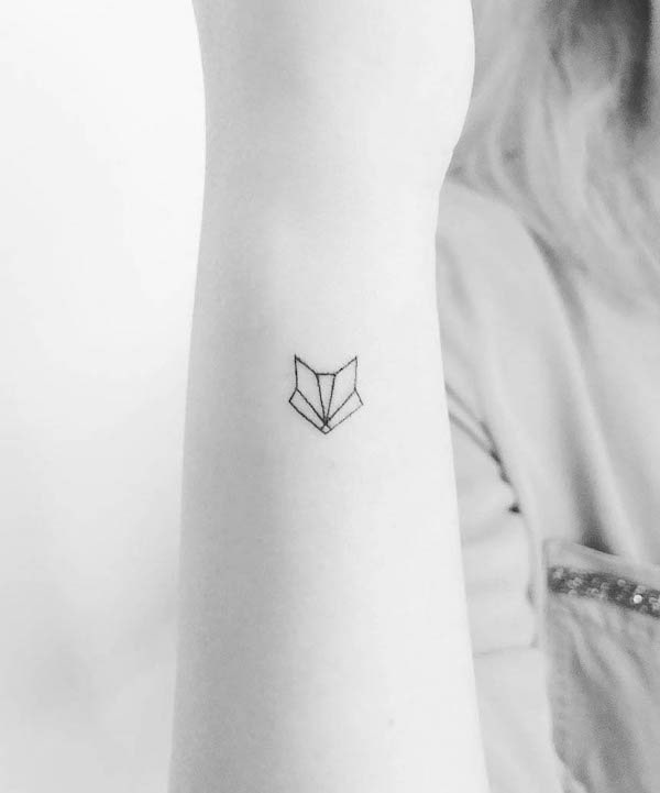 Tiny geometric fox head tattoo by @finelinetattooantwerpen