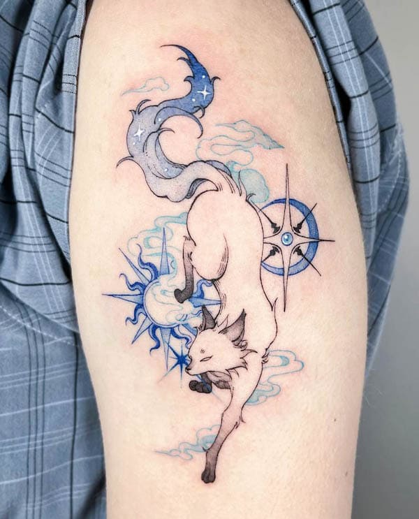 Whimsical blue fox arm tattoo by @sharkeeea_tt