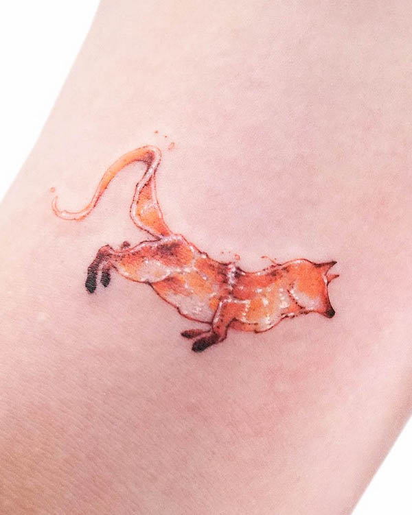 Small sparkling fox tattoo by @tattooist.inno_