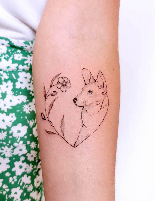 Fine-line flower and dog tattoo by @annalatacztattoo