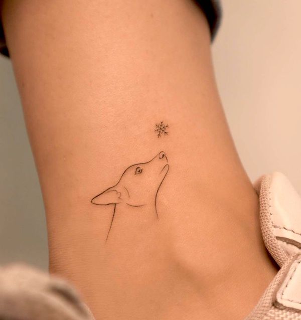 Simple dog and snowflake tattoo by @janapadar
