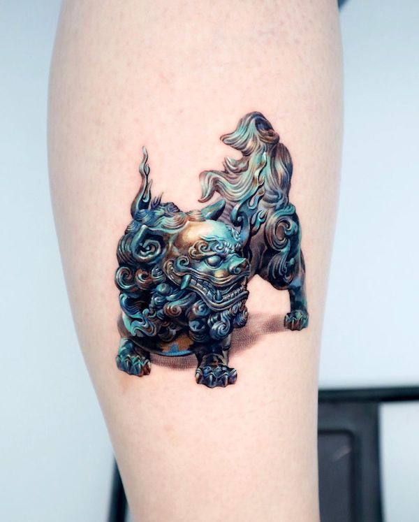 Realistic foo dog tattoo by @non_lee_ink