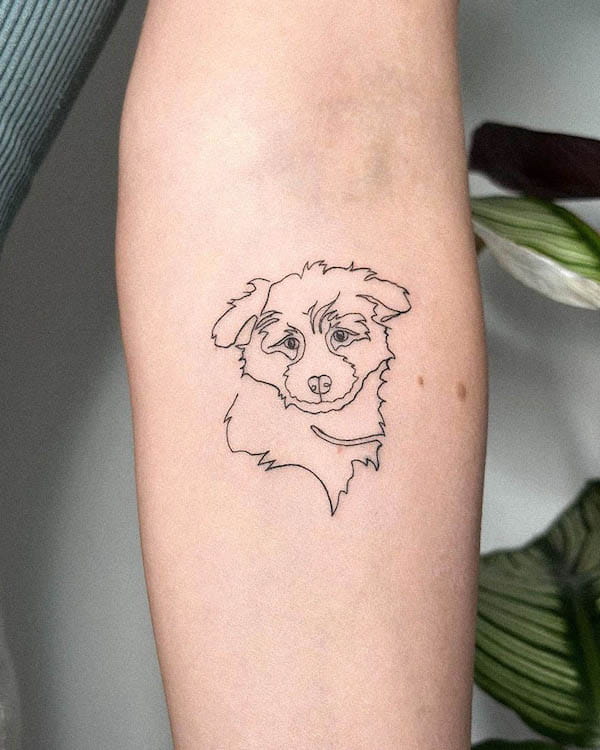 Single-line dog tattoo by @jish.art