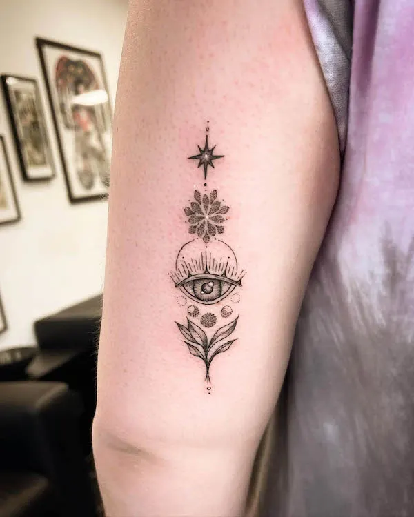 Symbolic tattoo on the back of the arm by @rebeccy_tattoos