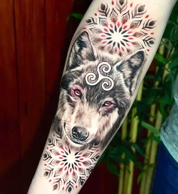 Wolf and mandala forearm tattoo by @ohmytattoo