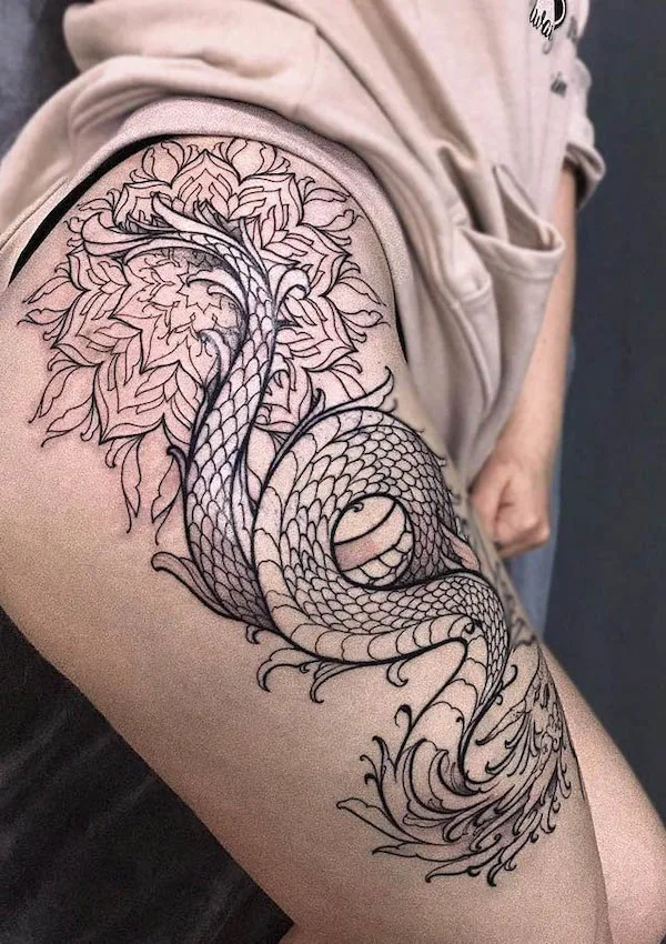 Intricate dragon and mandala tattoo by @ozzi_tattoo