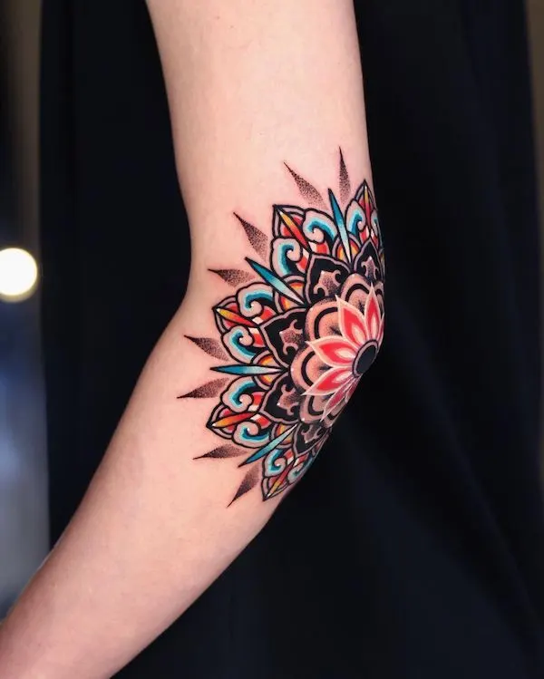 Colorful mandala elbow tattoo by @kiwa_jip