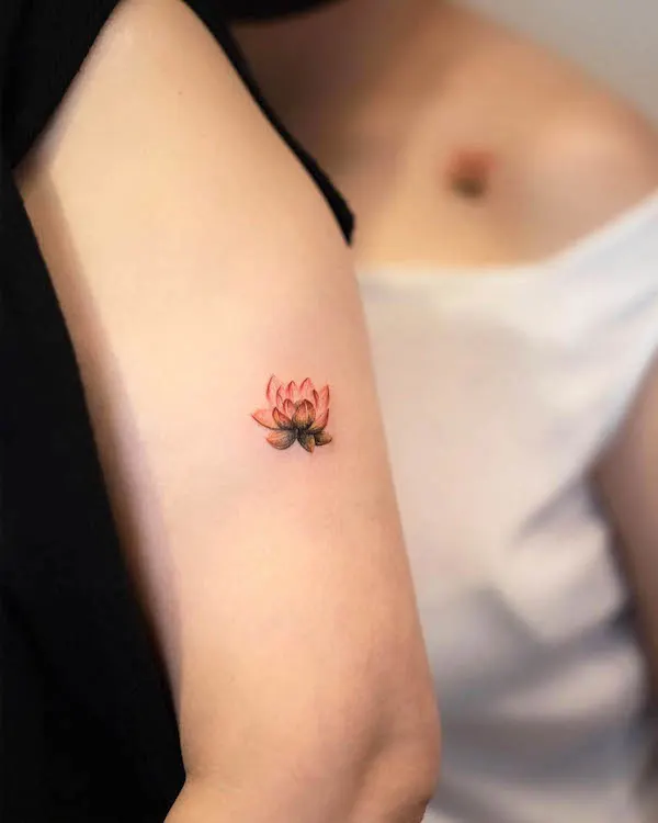 Small lotus tattoos by @handitrip